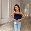 Yara | Blusa sofisticada adornada con plumas