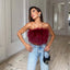 Yara | Blusa sofisticada adornada con plumas